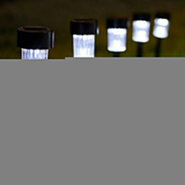 Sleek solar LED garden light with spike installation for easy placement.